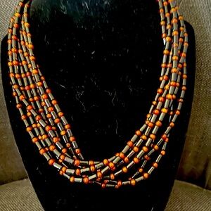 Elegant Multi-Strand Black and Gold Bamboo Coral Torsade Necklace